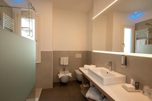 Foto del baño de Hotel Aurora