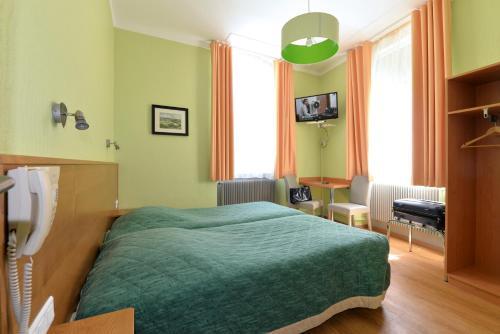 Foto de una habitación de Hotel Restaurant Dontenville