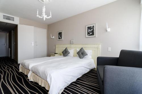 Foto de una habitación de Hotel du Parc