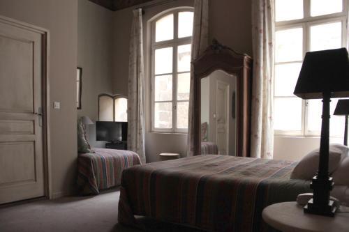 Foto de una habitación de Hôtel de l&amp;#039;Amphithéâtre