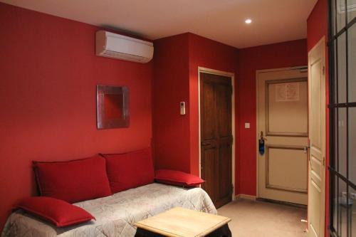 Foto de una habitación de Hôtel de l&amp;#039;Amphithéâtre