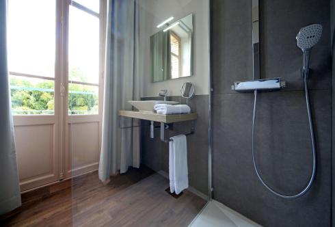 Foto del baño de Hotel La Verrerie