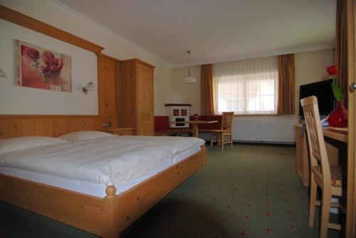 Foto de una habitación de Hotel Garni Forelle