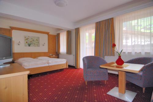 Foto de una habitación de Hotel Garni Forelle