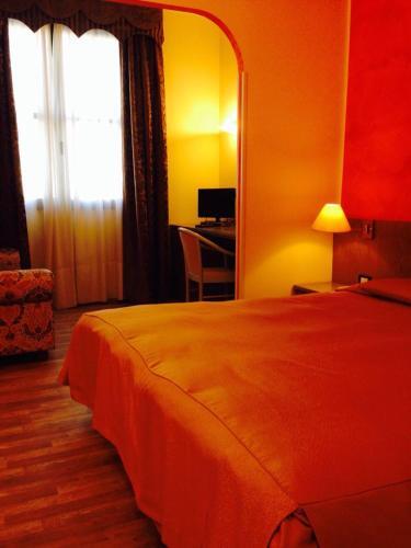 Foto de una habitación de Hotel Raffaello