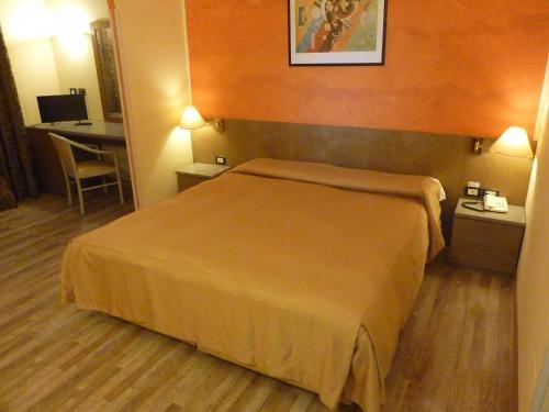 Foto de una habitación de Hotel Raffaello