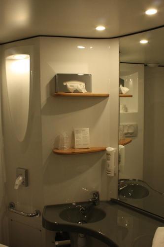 Foto del baño de Hotel Libera Caen Colombelles