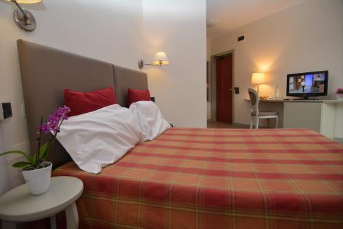Foto de una habitación de Hotel Al Ponte Garnì