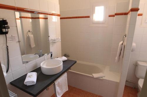 Foto del baño de Hotel de La Paix