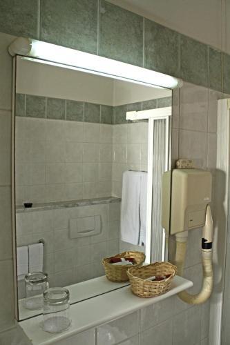 Foto del baño de Hotel La Pace