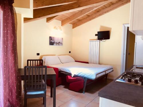 Foto de una habitación de Aparthotel Residence La Corte