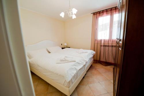 Foto de una habitación de Aparthotel Residence La Corte