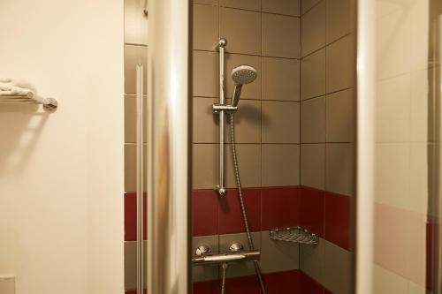Foto del baño de Aparthotel Tulip Inn Massy Palaiseau - Residence