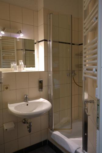 Foto del baño de Hotel Gästehaus Lisakowski