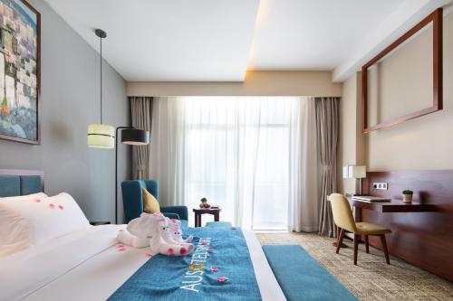 Foto de una habitación de Hotel Ausotel Smart Baiyun Airport