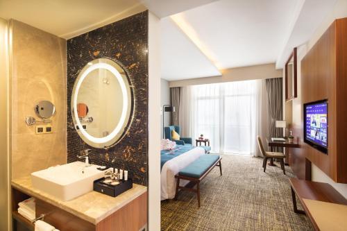 Foto de una habitación de Hotel Ausotel Smart Baiyun Airport