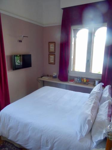 Foto de una habitación de Hotel Villa Fiordaliso