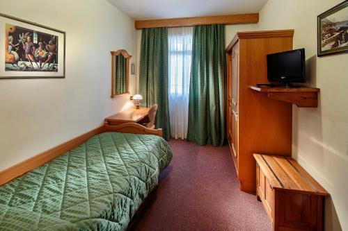 Foto de una habitación de Dependance Hotel Corona