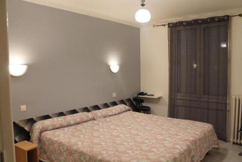 Foto de una habitación de Hotel Les Portes d&amp;#039;Or