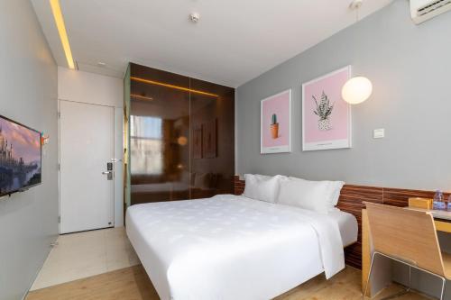 Foto de una habitación de Shenzhen Dongmen Colour Hotel