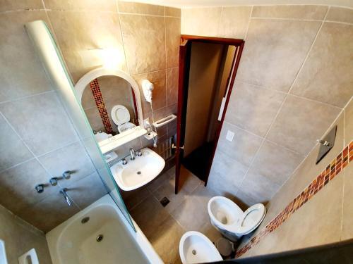 Foto del baño de Hotel La Cumbrecita