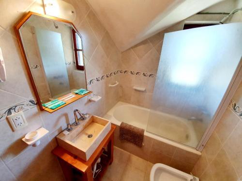 Foto del baño de Hotel La Cumbrecita