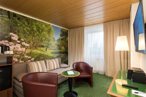Foto de una habitación de Ahorn Waldhotel Altenberg