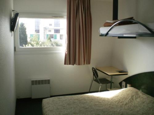 Foto de una habitación de Good Night Hotel