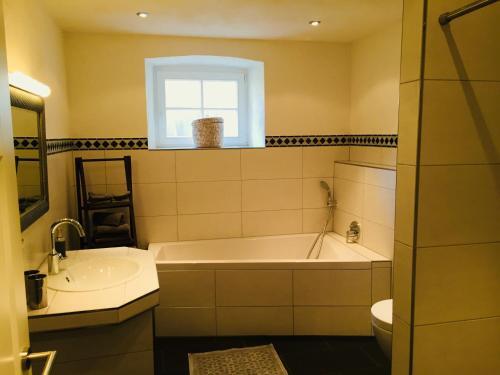 Foto del baño de Gästehaus Craintaler Mühle B&amp;amp;B