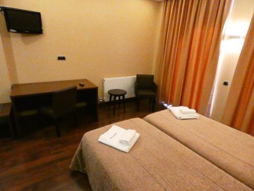 Foto de una habitación de Hotel Fuente del Miro