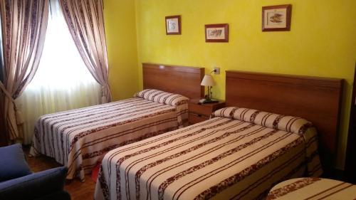 Foto de una habitación de Hostal La Plaza