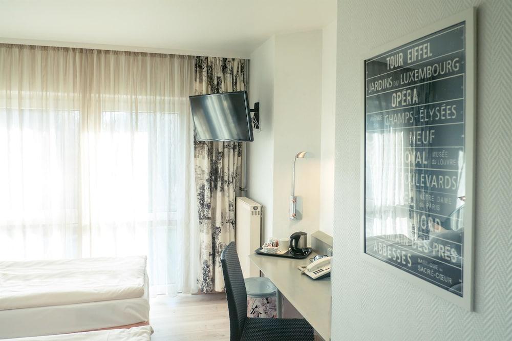 Foto de una habitación de Hotel Ambiente Langenhagen Hannover by Tulip Inn
