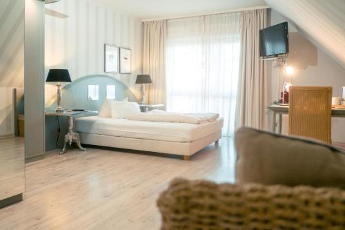 Foto de una habitación de Hotel Ambiente Langenhagen Hannover by Tulip Inn