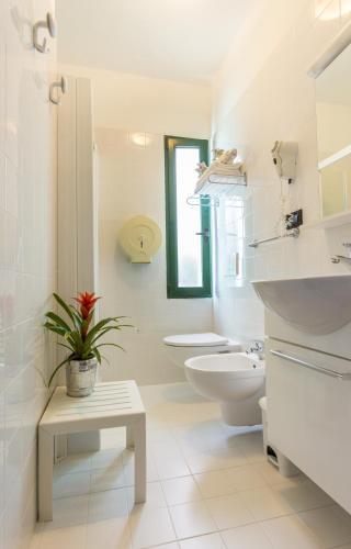 Foto del baño de Hotel Olanda