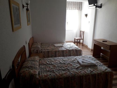 Foto de una habitación de Hostal Pineda