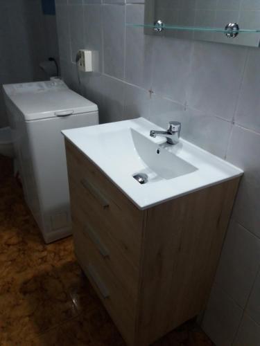 Foto del baño de Habitaciones cerca del mar