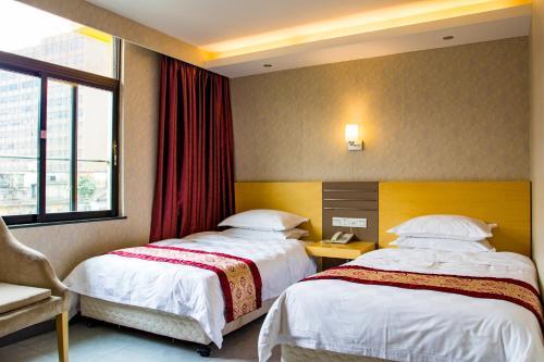 Foto de una habitación de Guang Dong Hotel