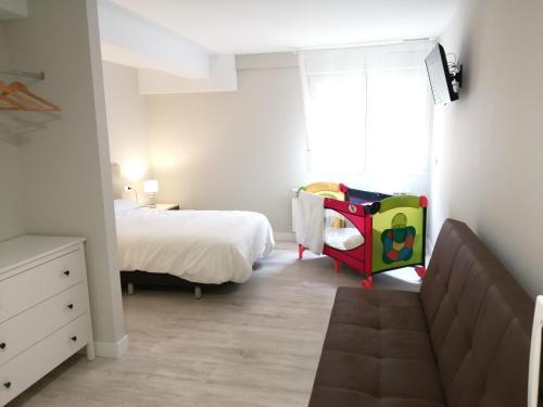 Foto de una habitación de Aparthotel Estudios los Arcos