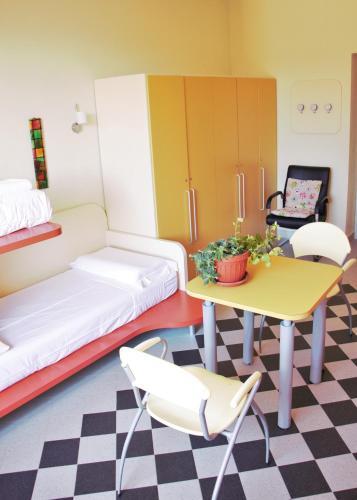 Foto de una habitación de Ostello La Miniera