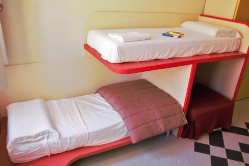 Foto de una habitación de Ostello La Miniera