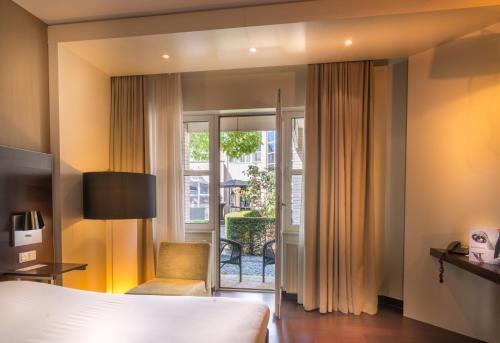 Foto de una habitación de Hotel Golden Tulip Ampt van Nijkerk