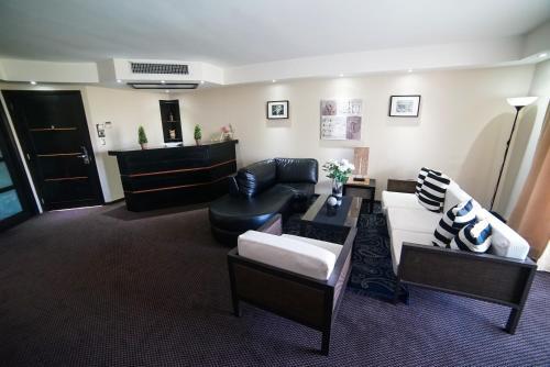 Foto de una habitación de Savoy Hotel Boutique