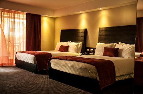 Foto de una habitación de Savoy Hotel Boutique