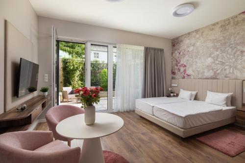 Foto de una habitación de NaturMed Hotel Carbona