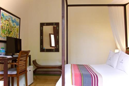 Foto de una habitación de Hotel Villa Colonial