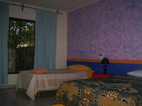 Foto de una habitación de Posada El Jardin