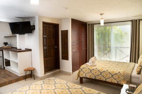 Foto de una habitación de Hotel Amar Inn