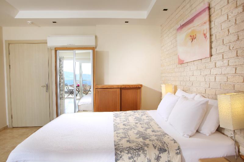Foto de una habitación de Hotel Saylam Suites