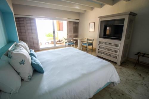 Foto de una habitación de Hotel Tres Vidas Acapulco