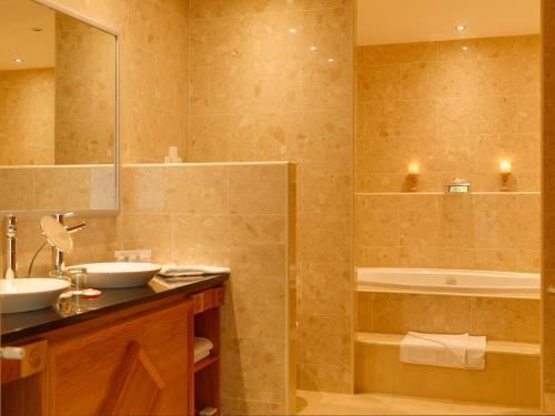 Foto del baño de Diamond Coast Hotel